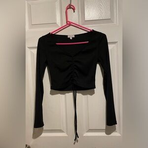 Ladies Black Crop Top with Long Sleeves in Good Condition. Size Medium. $6